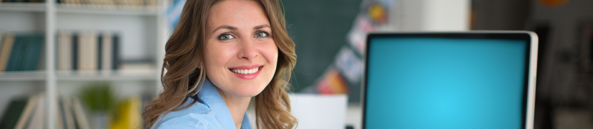 woman turned to look at camera and smiling