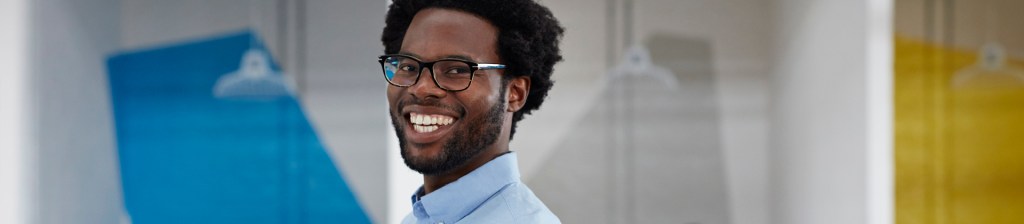 person smiling in office