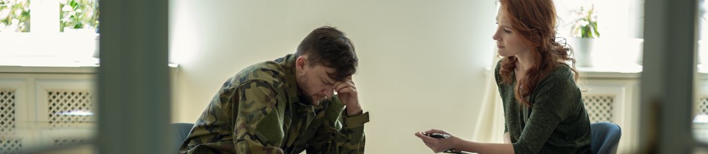 Military person chatting with therapist