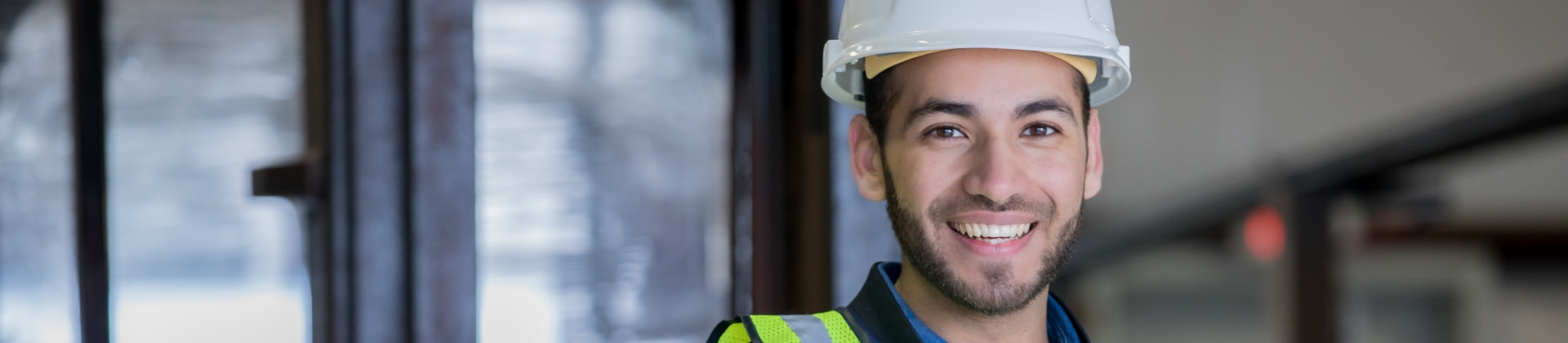 Person in construction hat and reflective vest