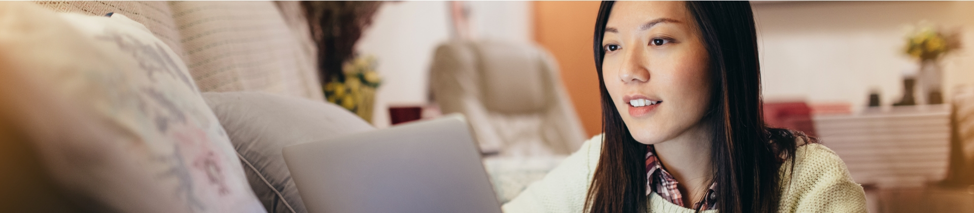 Person working on laptop at home