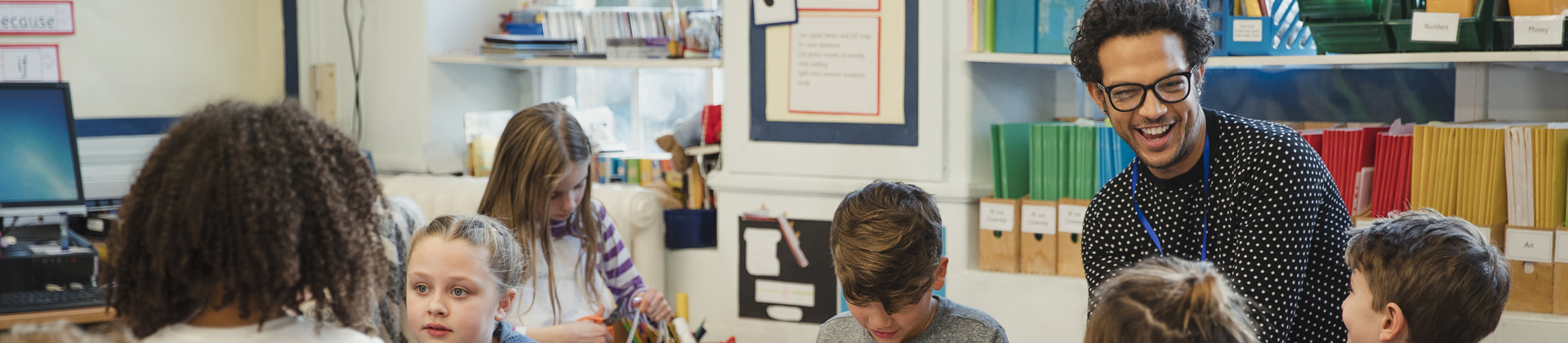 Teacher in classroom engaging with students