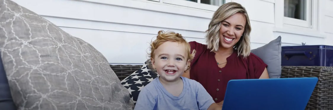 woman with toddler smiling